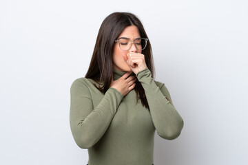 Young Brazilian woman isolated on white background coughing a lot
