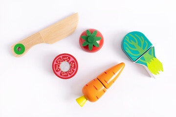 Food toys set on white background. Creative wooden design, vegetarian vegetable. Child development. Kids play.