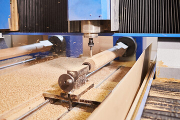 Wood carving machine. Modern automatic woodworking machine with CNC. Furniture production. - obrazy, fototapety, plakaty
