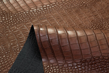 brown crocodile artificial leather with waves and folds on PVC base