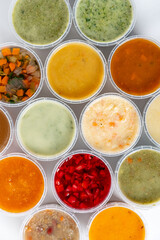 Top view of bowl with different soups
