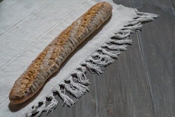 Baked bread on a sunlight with shadows