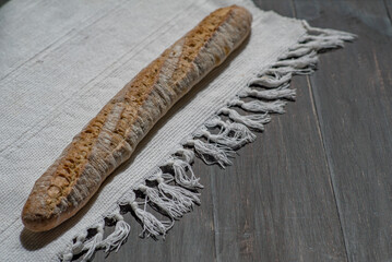 Baked bread on a sunlight with shadows
