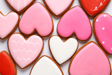 Obraz na płótnie Canvas Tasty heart shaped cookies isolated on white background