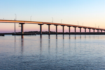 Fototapeta na wymiar Highway 98 bridge over the Apalachicola River during the blue hour.