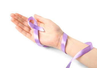 Female hand with lavender ribbon on white background, closeup. Cancer awareness concept