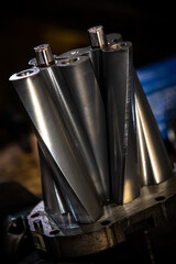 Internals taken out from an internal combustion engine supercharger in a workshop.