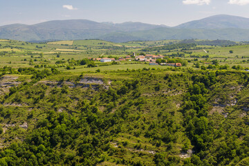 Obraz premium Untzaga village near to Nervion river canyon and Delika valley, Araba, Basque Country, Spain.