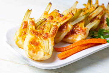 Roasted Fennel with Cheese. Sliced fennel oven roasted in olive oil.