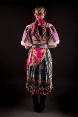 Young beautiful slovak woman in traditional dress. Slovak folklore