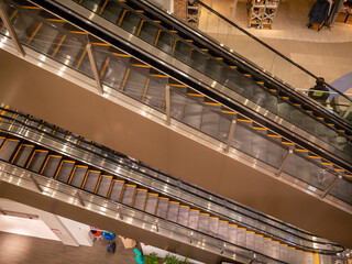 moving escalators of the shopping mall in tokyo