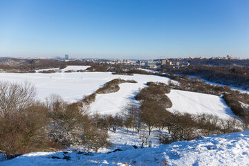 Fototapeta na wymiar Snowy sunny Ticha Sarka in the Winter, Nature Reserve in Prague