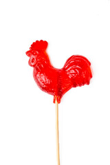 Rooster shape lollipop isolated on white background - rooster candy (Turkish name; horoz sekeri)