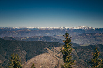 Landscape of snow-capped peaks, late winter early spring