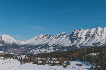 A picturesque landscape view of the French Alps mountains on a cold winter day (La Joue du Loup, Devoluy)