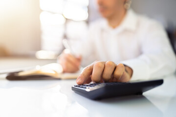 Public Tax Accountant Using Calculator