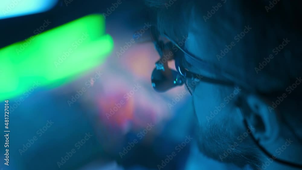 Poster technician engineer developer is soldering iron pcb microcircuit electronic component though magnifi
