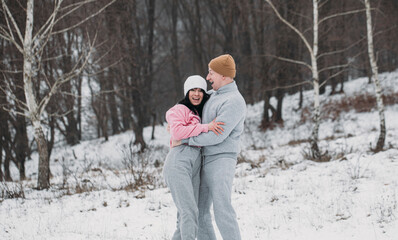Fototapeta na wymiar couple in park. Winter couple. Happy day. Snow background. Sensual. Love. 