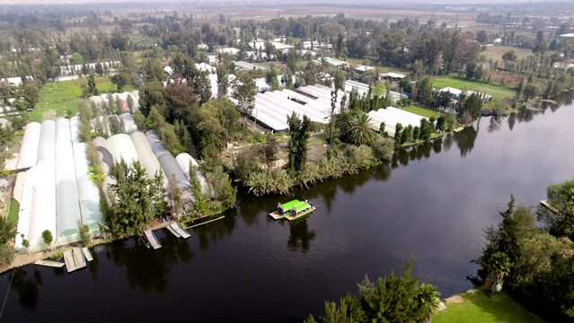 drone shot of trajineras in Xochimilco