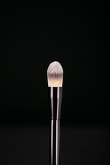 make up stuff on black background