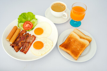 Top view American breakfast set on white background.