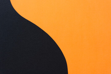 abstract paper background in orange and black