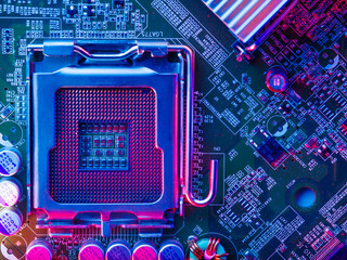 The desktop of the processor lies with the contacts up on the motherboard of a personal computer....