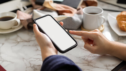 Female checking email on her smartphone. phone blank screen
