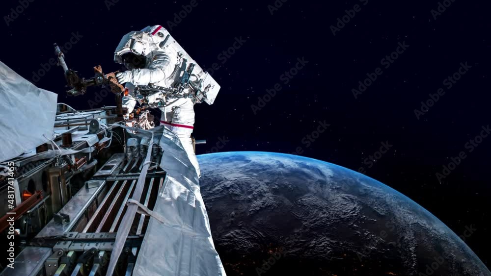 Wall mural astronaut spaceman do spacewalk while working for spaceflight mission at space station . astronaut w