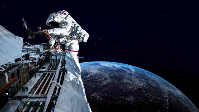 Astronaut spaceman do spacewalk while working for spaceflight mission at space station . Astronaut wear full spacesuit for operation . Elements of this image furnished by NASA space astronaut photos .