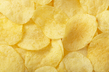 Full frame foodbackground of potato chips, top view