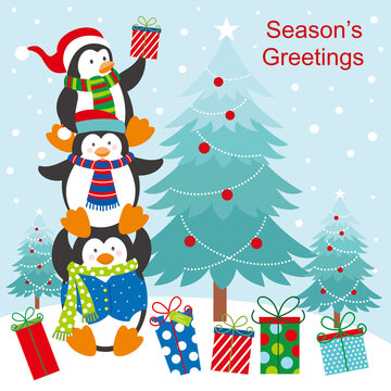 christmas card with penguins and gifts