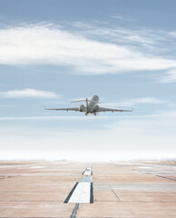 Fototapeta na wymiar Modern executive business jet take off from airport runway