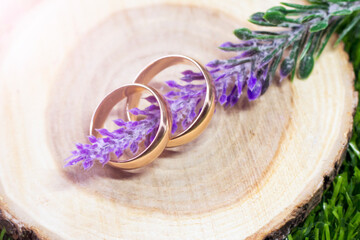 Wedding rings and a bouquet of lavender