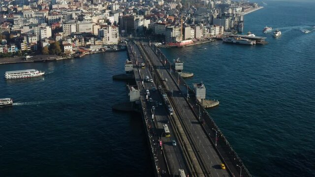 Vehicles Crossing The Galata Bridge Over The Golden Horn In Istanbul, Turkey. aerial