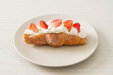 strawberry fresh cream croissant on plate