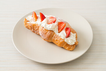 strawberry fresh cream croissant on plate
