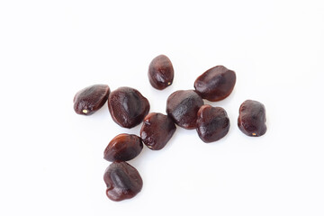 Tamarind seeds isolated on white background.top view