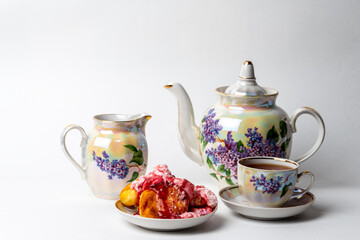 Cheesecakes Syrniki on a plate with cherry sauce. Cuisine of Ukrain and Russia.