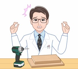 白衣を着た研究者の男性