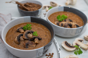 Mushroom soup of champignons and lentils
