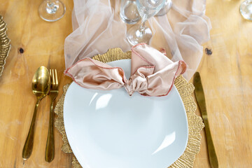 Bohemian and natural, soft pink and green table setting