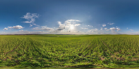 Fototapeta na wymiar evening hdr 360 panorama view among farming fields with sunset clouds in full seamless equirectangular spherical projection, ready for VR AR virtual reality content