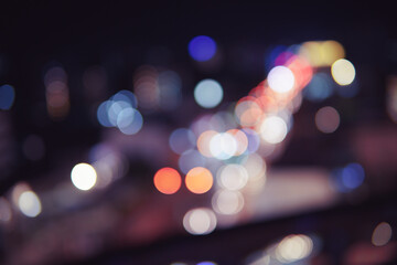 night time round bokeh defocus background texture, black darkness, town city light, cityscapes abstract wallpaper in futurist