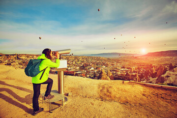 Pedestrian tourism, people travel with backpacks, in the open air.