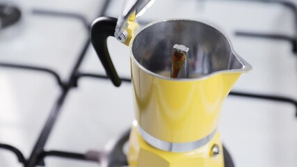 Coffee espresso in Yellow moka pot