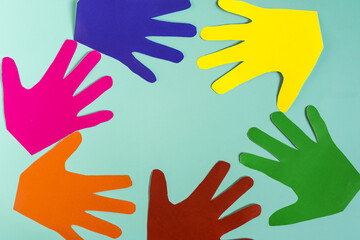 Obraz premium Abstract palm background made of colored paper on a colored background.