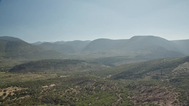Marvelous view ofer greek mountainside with clear blue sky