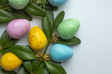 Fototapeta na wymiar colorful easter eggs with flowers and leaves