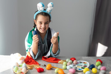 little girl with uae flag for easter